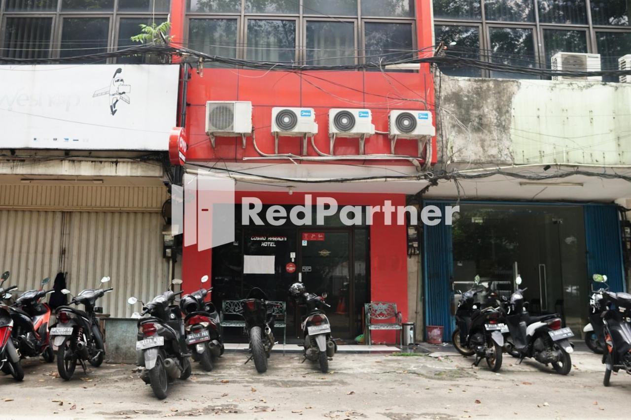 Cosmo Harmoni Redpartner Hotel