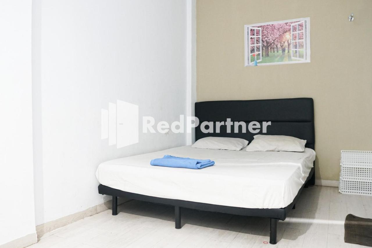 Cosmo Harmoni Redpartner Hotel