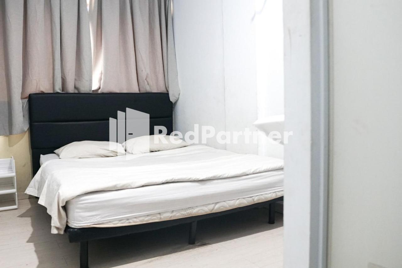 Cosmo Harmoni Redpartner Hotel